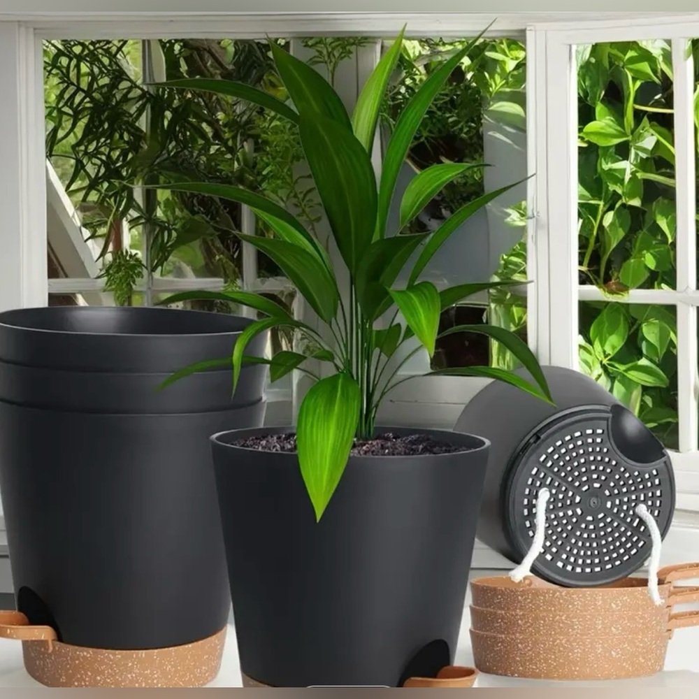 Brand new in box-Set of 5, self watering flower pots